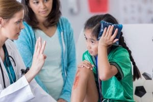 little girl with concussion and sore head
