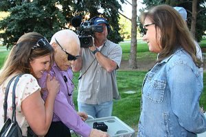 The first patient to receive a bionic eye gets a hug.