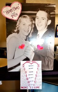 This photo shows a couple in an old photo from when they met. “Viv” and “Woody” had their first date at a University of Wyoming dance in 1954. They’ll celebrate 60 years of marriage in 2017.