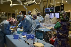 A team of cardiologists with the UCHealth Heart Center at Medical Center of the Rockies performs Vivian’s TAVR, a less-invasive procedure in which the team works together to place a collapsible artificial valve into the heart through Vivian’s artery. Photo by Kelly Tracer, UCHealth.