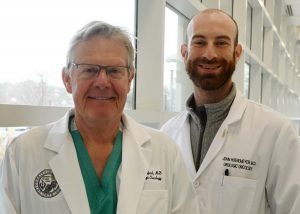 E. David Crawford, MD (left), with Urology Research Fellow John Hoenemeyer, MD.