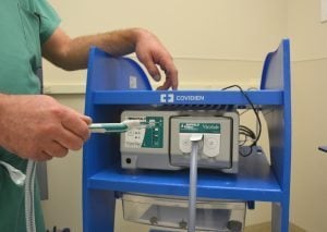 This photo shows one of a dozen portable smoke evacuators used in the ORs at UCH.