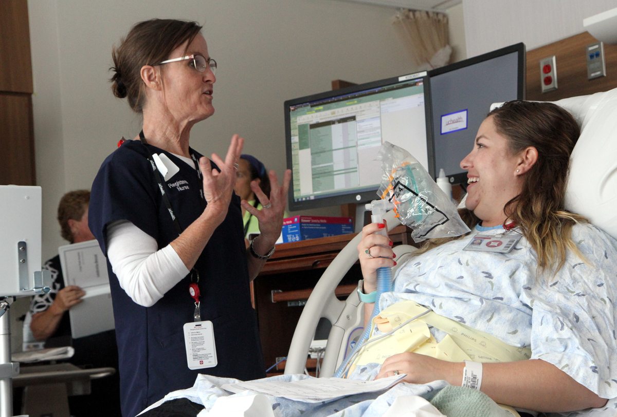 A nurse explains how nitrous oxide works during a mock birth at UCHealth Longs Peak Hospital before Colorado newest hospital opened.