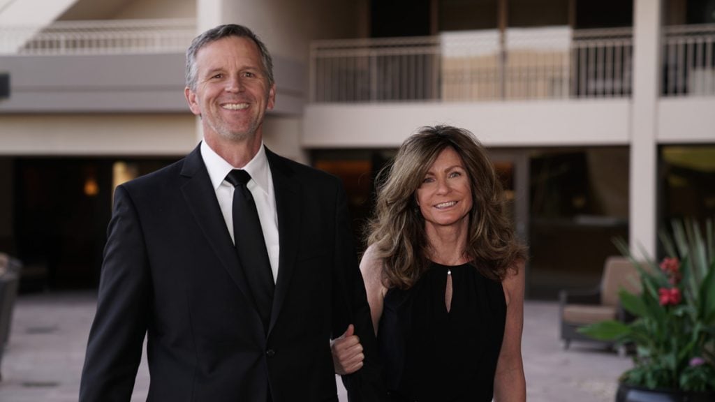 Don Soltis attends a work event with his wife, Kris.