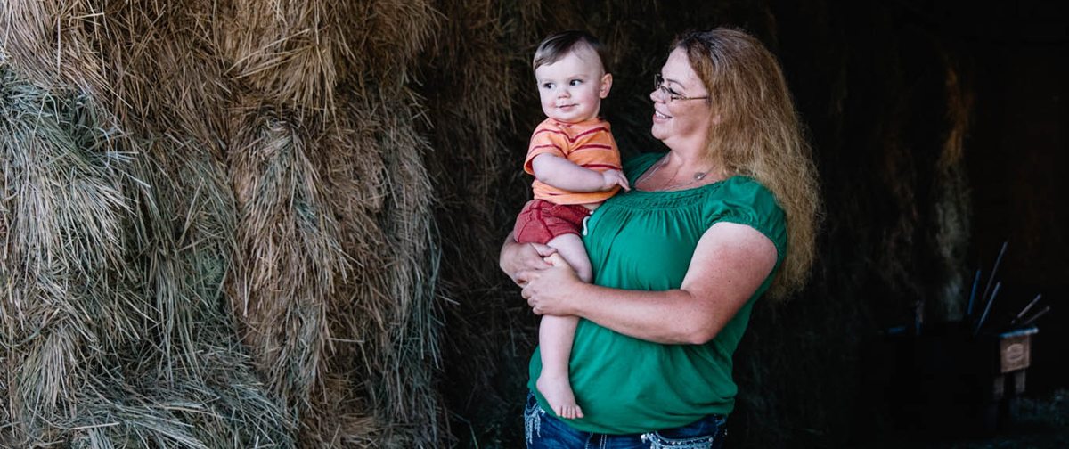 Veronica Wilkins holds her youngest son, Thane, who was born via an amergency C-section right before Veronica had to have open heart surgery.