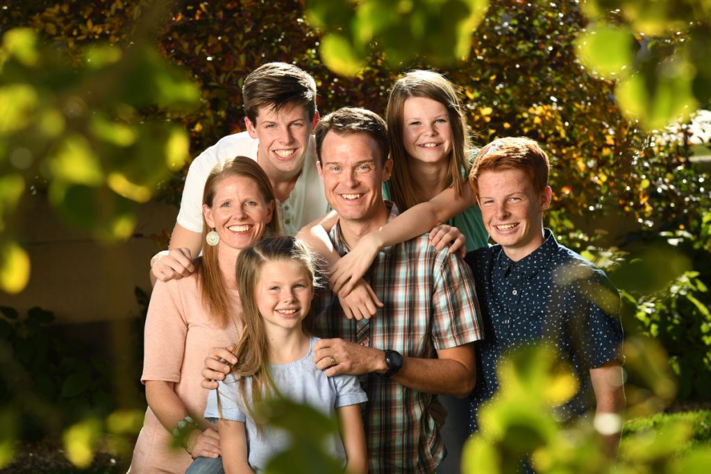 Zach Owen and his wife, Ginet, at home with their kids, left to right, Wyatt, Addie, Summer and Bodie