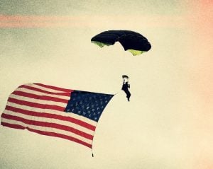 A person is shown with a parachute.