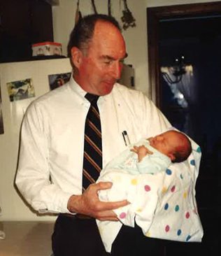 Dr. Karl Shipman died tragically from unrecognized sepsis. Here, he holds his granddaughter, Kali, when she was a newborn. Shipman's daughter and Kali's mom has dedicated her career to preventing sepsis deaths.