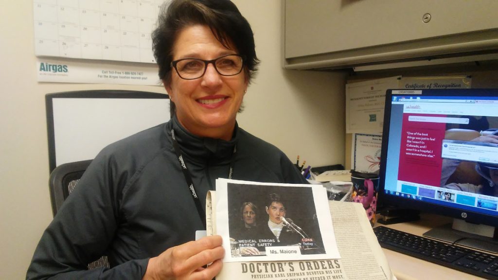 Debra Malone, a UCHealth nurse, is dedicated to preventing sepsis death. Here she holds a clipping of a newspaper article about her dad's death from sepsis.