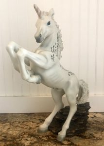 A photo of a sculpture of a unicorn