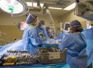 Surgeons operate on a patient at UCHealth University of Colorado Hospital.