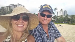 Evelyn and Don Schwandt pose for a photo on the beach in Hawaii. Don used to be stationed there and they love being on the beach.