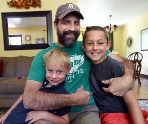 Tom Essig with sons Colton, left and Wyatt (courtesy Amy Essig)