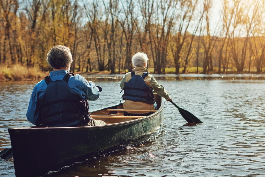 Shot of a senior couple going for a canoe ride on the lake