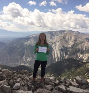 Daniell Fixen poses at the top of a Colorado 14er. Fixen is a pharmacist who has had to learn more about whether marijuana is safe for older adults since she works at a clinic where many older patients are asking if marijuana is safe.