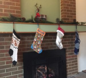 stockings hanging over a fireplace