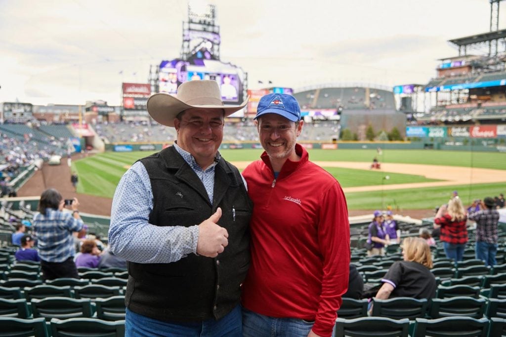 Mike Brashear with Dr. Daniel Pollyea at Coors Field.