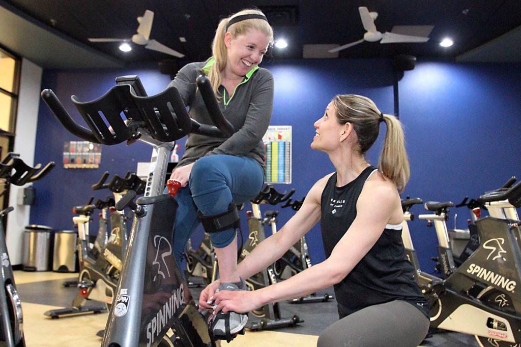 Image showing how Amy still needs help because of the disabilities her stroke left her with.