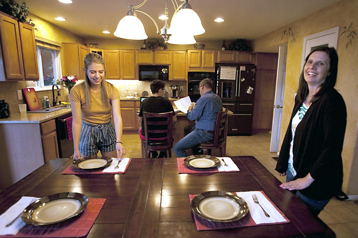 family working in kitchen