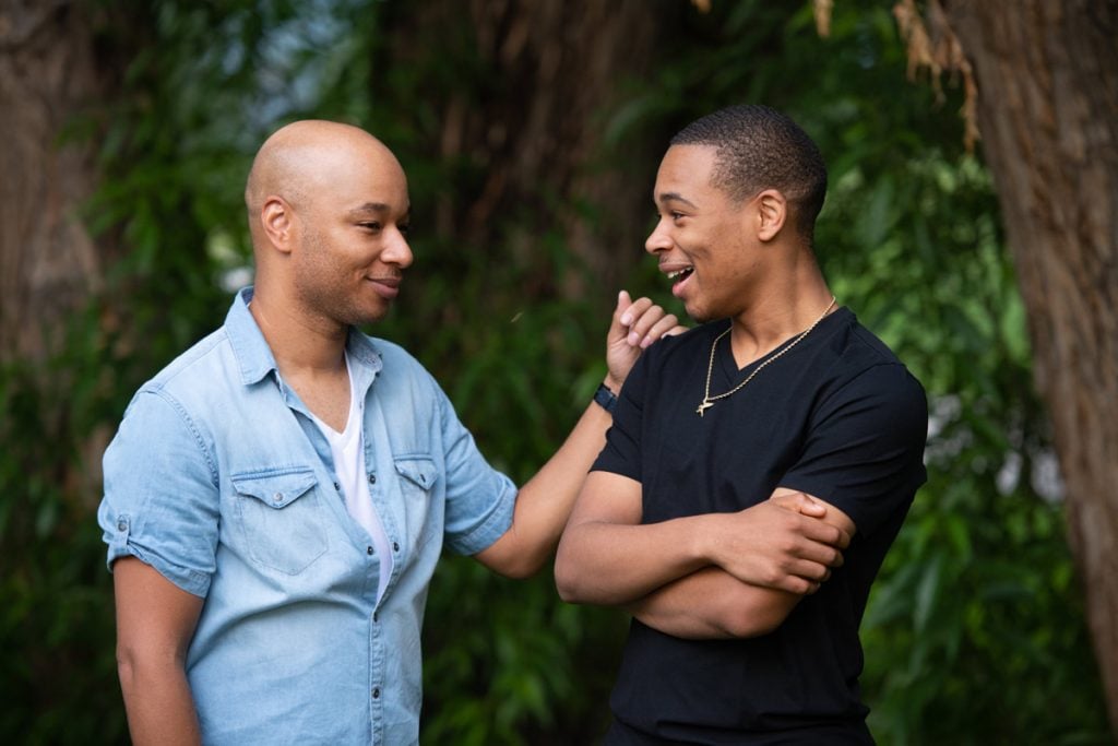 Dominique Waithe-Cunningham and his son, Christian, share a moment together