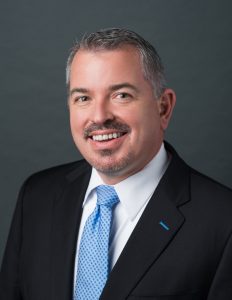 A photo of Joel Yuhas