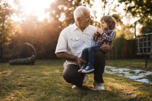 grandfather talking about coronavirus with a child.