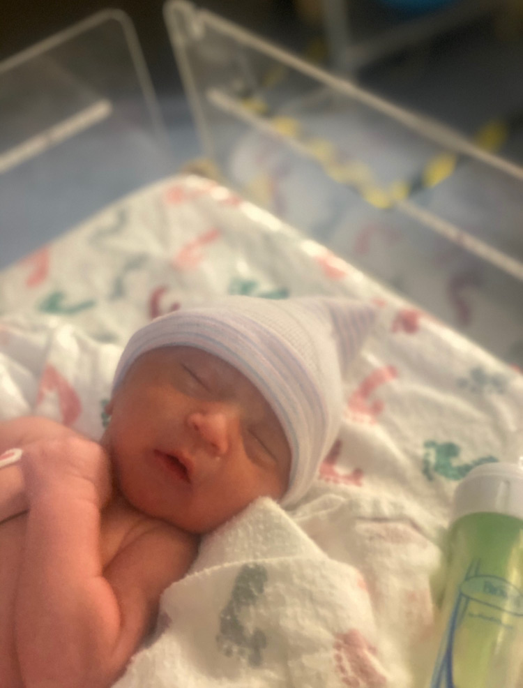 baby in the NICU born 35 weeks in a birth while COVID-positive.