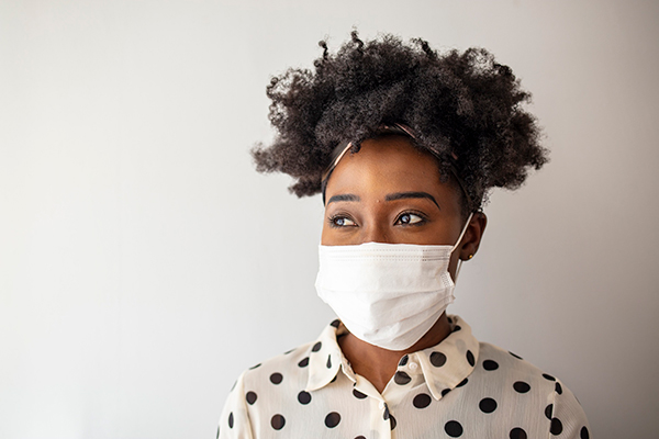 the science of masks. A young woman wears a mask.