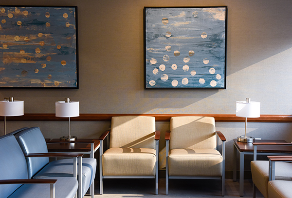 exceptional cancer center in Cherry Creeek. A waiting room with colorful art in the infusion center at Cherry Creek Medical Center