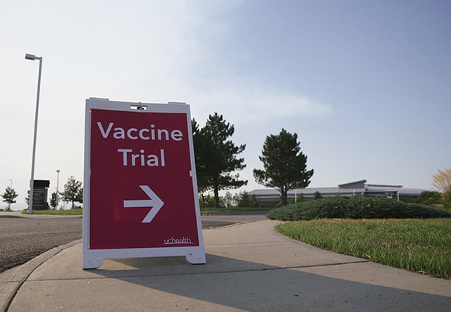 A sign points to where the vaccine trial is being conducted in northern Colorado..