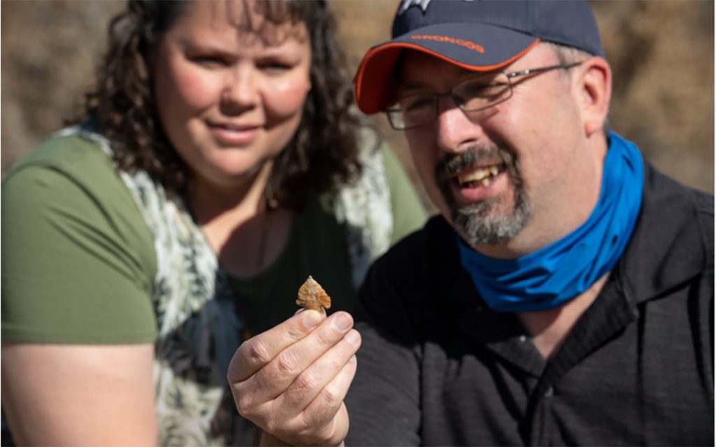 Clay Phillips displays an arrowhead that he found near Hardscrabble Creek.