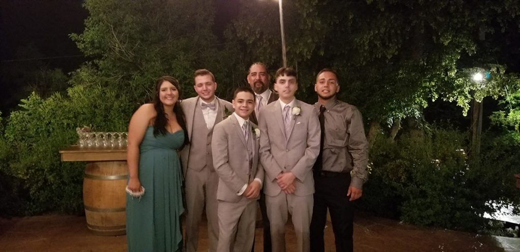 Casey Betancur, center, with his five children, all of whom have supported him during his battle with solitary plasmacytoma.