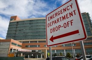 Colorado COVID-19 spike this fall is setting records. Sign that says "Emergency Department Drop-Off'' at UCHealth University of Colorado Hospital.