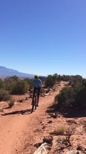 Debbie Bunten, who survived Stage 4 ovarian cancer, biking in Moab, Utah.
