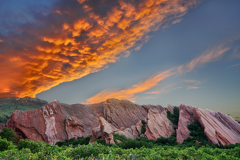Among the great parks in Denver's backyard is Roxborough, southwest of Denver. It's a great place to hike. Here we see and orange sunset over red rocks that jut up from the ground. Photo: Getty Images.