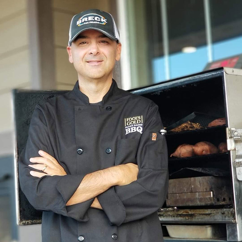Brian Rodgers, after he switched to plant-based eating, in his plant-based bbq chef's shirt.