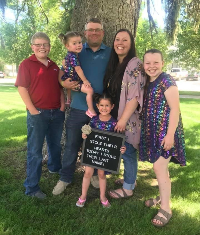 Bryan, Colorado's first COVID-19 patient to receive a double lung transplant, and Trinity Raymond with their children. From left: Ryder, Rivyr, Raegyn and Renzey. Photo courtesy Bryan and Trinity Raymond.