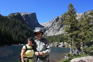 : Dennis Mullen and wife Nancy enjoy a day at Dream Lake in Rocky Mountain National Park. Mullen was diagnosed with Parkinson’s disease in 2010. Photo courtesy of Dennis Mullen.