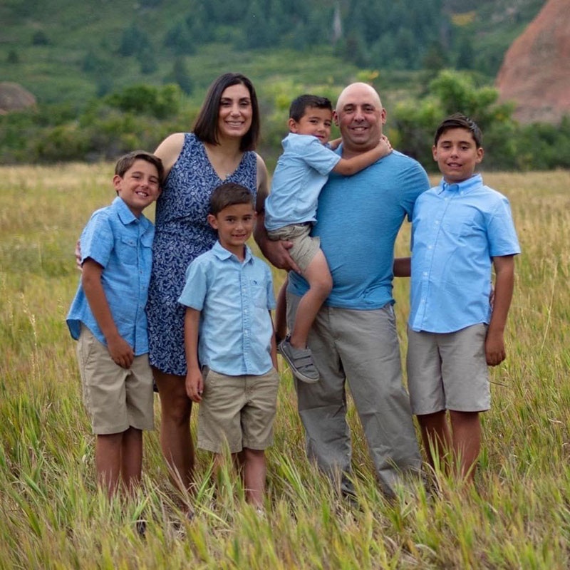 Cathy and Tony Pane pose with their four sons.