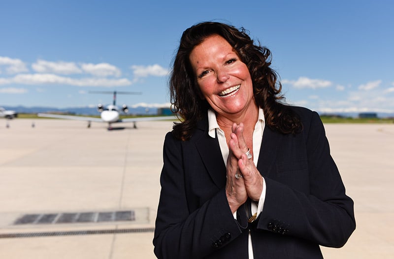 Gail Sadler, a lung cancer patient, outside Modern Aviation at Centennial Airport.