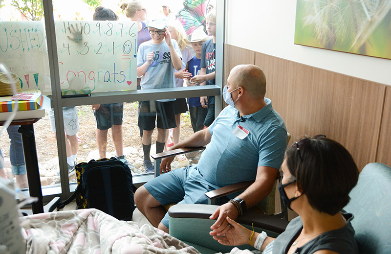 Cathy Pane finished up chemotherapy for small bowel cancer as family and friends gathered outside to help her celebrate.