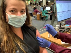 Dr. Molly Hoss receiving her COVID-19 vaccine