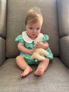 Juliana with one of her favorite stuffed animals.