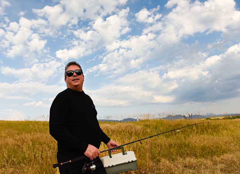 liver transplant patient, seeing here with his fishing tackle, will get a third dose of COVID-19 vaccine.