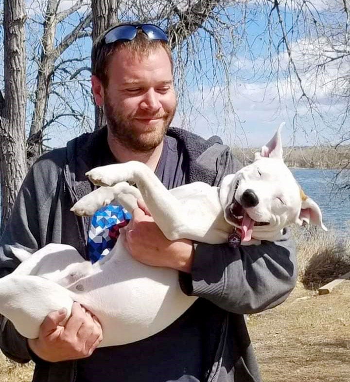 Keith Thiel with his dog, Kaiju before his accident that nearly took his life.