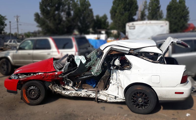 Keith's car after another vehicle T-boned it going 55 mph. Photo courtesy of Keith Thiel.