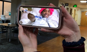 Candice Davis in her hospital bed in Philadelphia, Pennsylvania, after a severe case of COVID resulted in amputation.