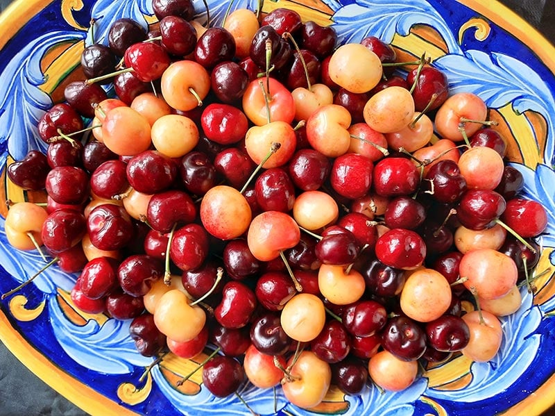 Yellow-tinged Rainier cherries, garnet-hued Bings and dark mahogany Santinas. Photo courtesy of Bill St. John.