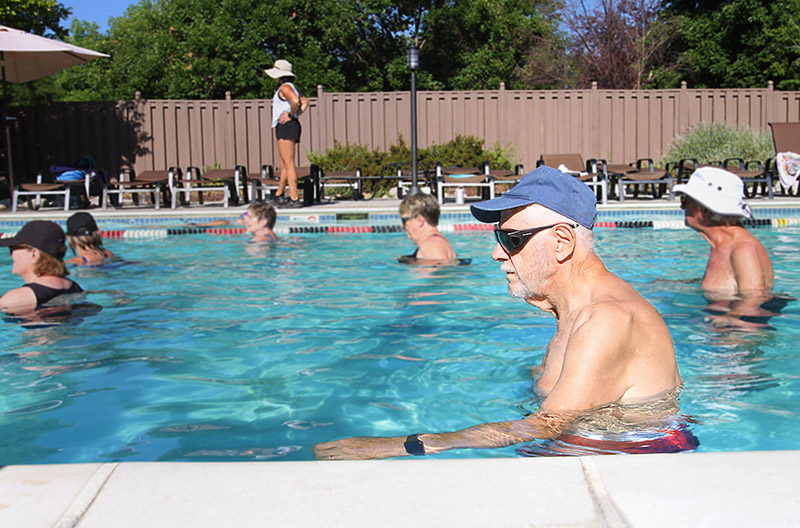 Richard is in the pool doing exercises. he made healthy changes in his 80s and believes you are not too old to get healthy.