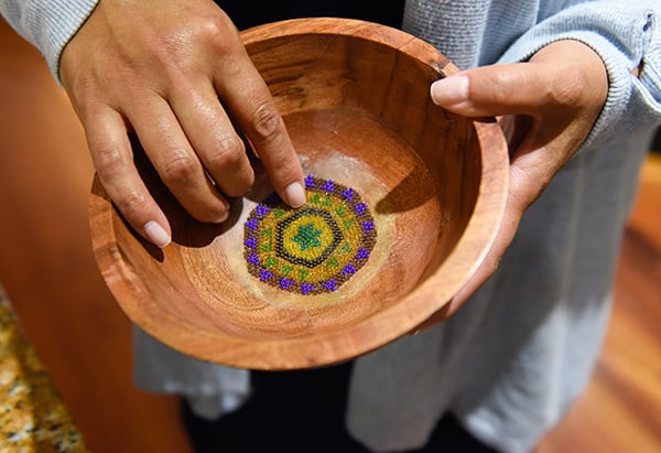 Dr. Abbey Lara has been learning more about her Mexican and indigenous roots. She recently started learning to do bead work. Photo by Cyrus McCrimmon for UCHealth.